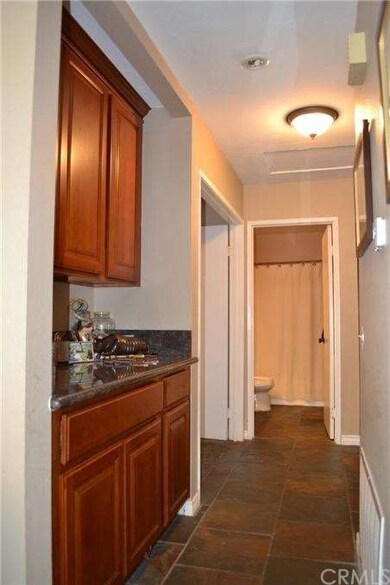 Hall showing slate flooring throughout