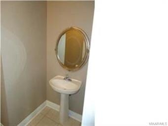There is a Half Bathroom just off of the Foyer.