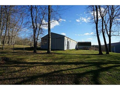 Stable/Barn. A hay shed, built in 2002 holds about