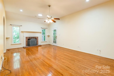 gas fireplace & opens to screened back porch
