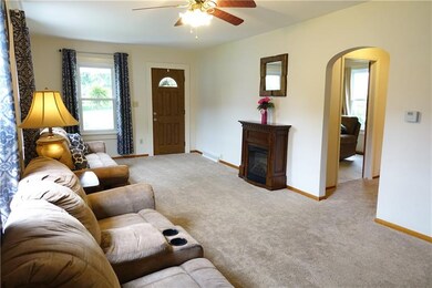 Spacious Lliving Room with newer carpeting