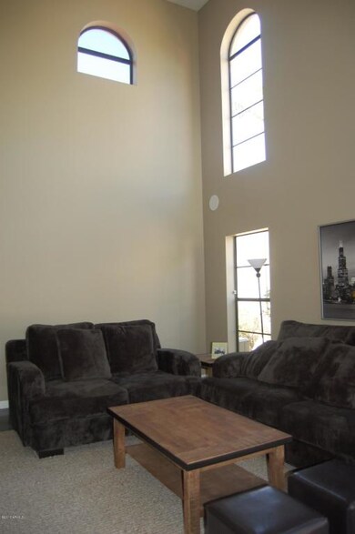 LIVING ROOM W/ HIGH WINDOWS & CEILINGS!