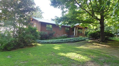 Another view of the front showing the beautiful hosts blooming in the front yard.
