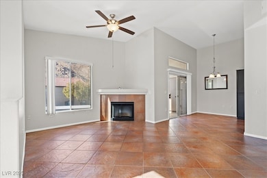 Unfurnished living room featuring a tile fireplace