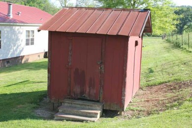 Old Smokehouse, being used for storage