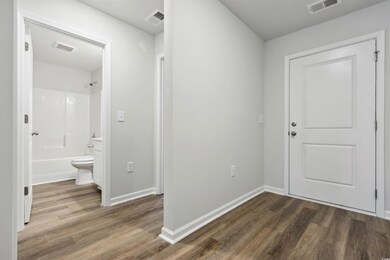 Entryway featuring dark hardwood / wood-style floo