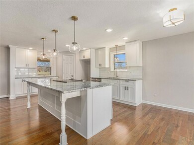 1000 Wesley Ave, Raymore, MO 64083 - photo 6