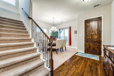 View toward the dining room and front door.