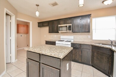 7433 Maxroy St, Houston, TX 77088 - photo 7