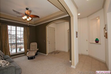 Open entry offers tile flooring and lighted displa