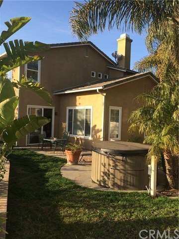 Backyard has above ground Spa