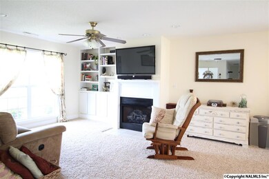 THE GREAT ROOM OFFERS A BUILT IN CABINET TO SHOWCASE YOUR PHOTOGRAPHS, COLLECTIONS AND BOOKS!  THERE IS ALSO A GAS LOG FIREPLACE!