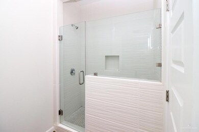 Bathroom with an enclosed shower