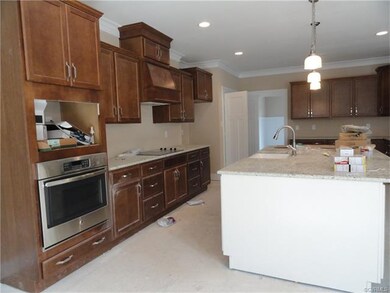 Kitchen with custom cabinets, granite countertops 