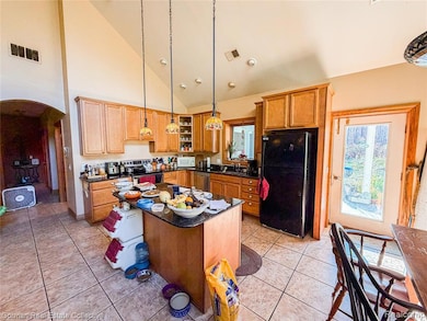 Kitchen featuring kitchen island