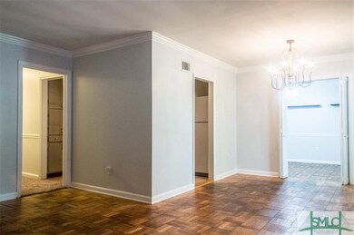 Hallway leading to the bedrooms, kitchen entry, di