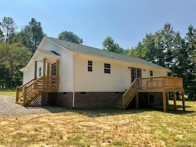 Rear of home. 12' X 12' Deck off Dining Room for o