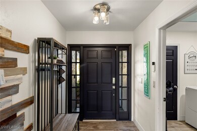 Foyer entrance featuring washer / clothes dryer an