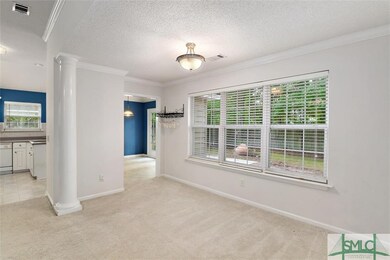 View from family room looking thru dining area int