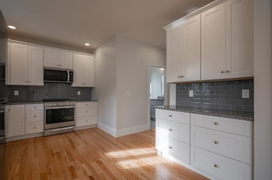 48 Wilderness Dr unit The Star, Nashua, NH 03062 - photo 3