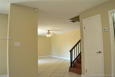 Living Room stairs access second floor.
