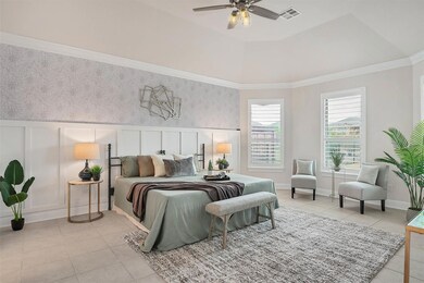 Bedroom with a wainscoted wall, a decorative wall