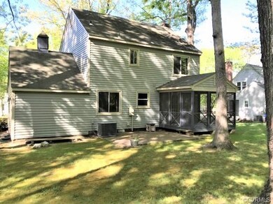 Rear View showing Screened Porch & Paver Patio