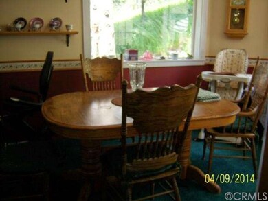 ANOTHER VIEW OF THE DINING ROOM SHOWING WINDOW DIS