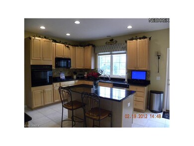 The bright kitchen was recently remodeled to inclu