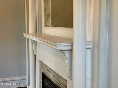 Original Fireplace In The Living Room