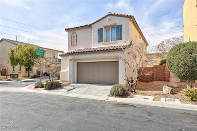 Mediterranean / spanish house with a garage