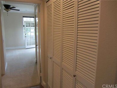 washer and dryer behind bi-fold doors