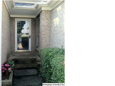 Entry with storm door.