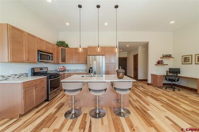 Open concept kitchen with dining and breakfast bar