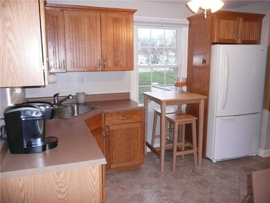 UPDATED KITCHEN WITH OAK CABINETRY