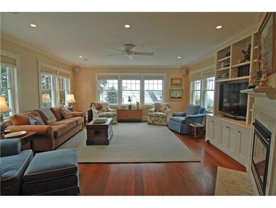 Living Room. Mahogany floors, custom...