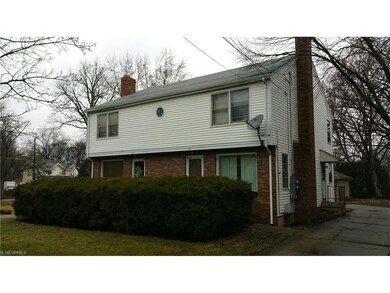 View looking northwest showing side entrance.