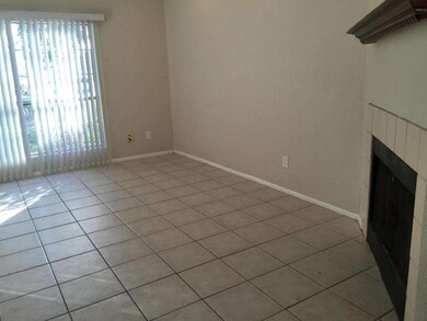 Tiled Living Room with Fireplace