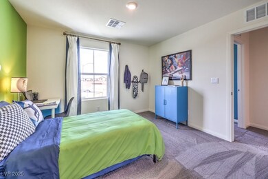 Carpeted bedroom with baseboards and recessed lighting