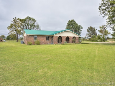 1051 N Caney St, Copan, OK 74022 - photo 2