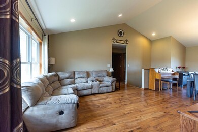 living room with vaulted ceilings