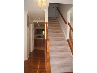 Entry/Foyer. The foyer features gleaming hardwood 