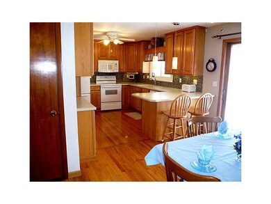 Kitchen. Updated kitchen with breakfast bar, tiled