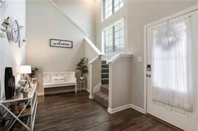 Soaring ceilings as you enter with sitting area