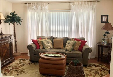 Formal living space with a tray ceiling to the lef