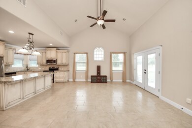 The living room flows well into the kitchen, and h