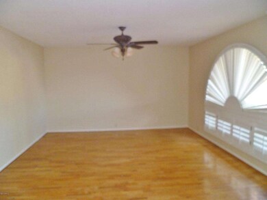 LIVING RM- w/ shutters & wood floors!