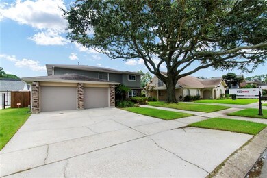 The majestic oak tree shades the property.