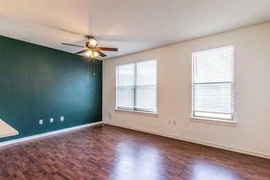 Unfurnished room featuring dark wood finished flo