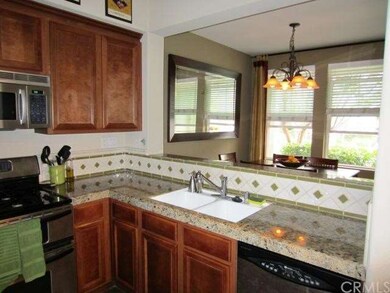Open kitchen with granite countertops 